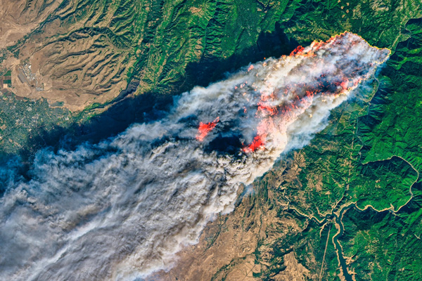 View of an active wildfire from above.